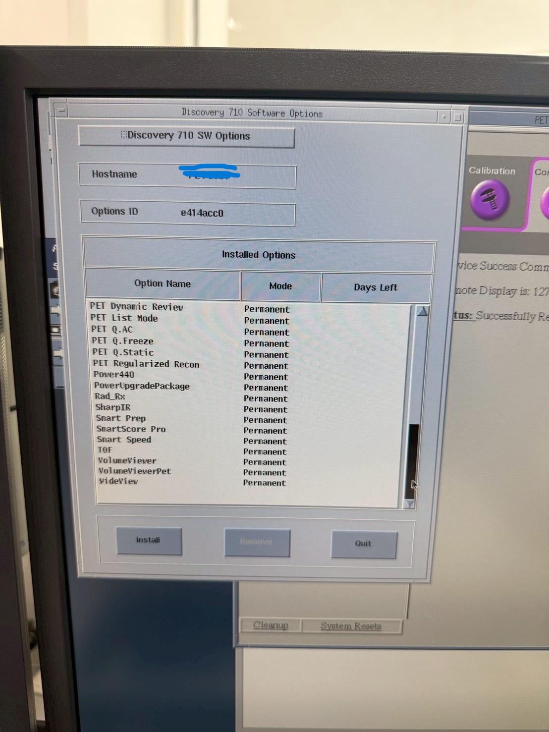 GE Discovery 710 installed software options — PET Dynamic Review, PET List Mode, PET Q.AC/Q.Freeze/Q.Static, PET Regularized Recon, SharpIR, SmartScore Pro, Smart Speed, TOF, VolumeViewer, VolumeViewerPet, WideView