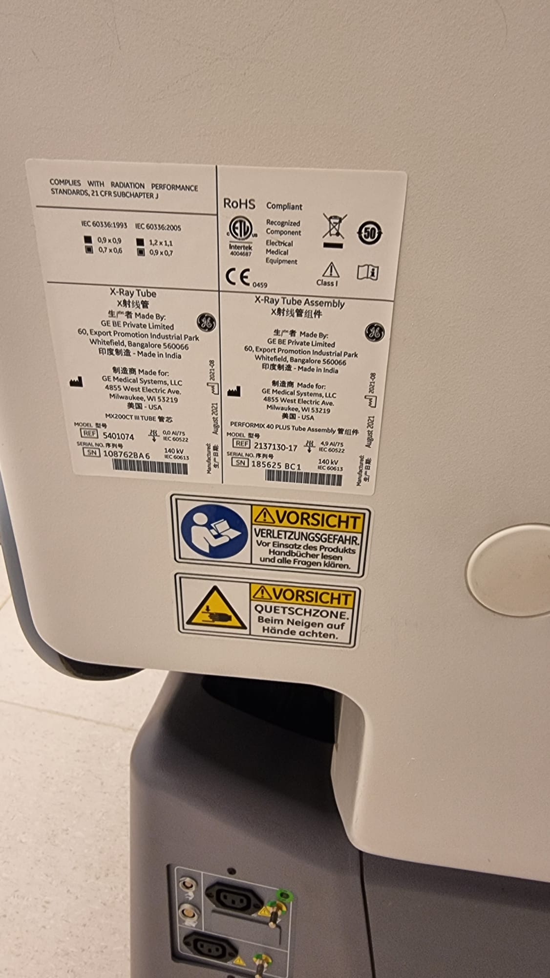 GE PERFORMIX 40 PLUS X-ray tube assembly REF 2137130-17 SN 185625 BC1 and MX200CT III tube insert REF 5401074 SN 108762BA6 OEM labels for GE Optima CT660 — manufactured August 2021, 140 kV, focal spots 0.7×0.6 and 0.9×0.7 mm