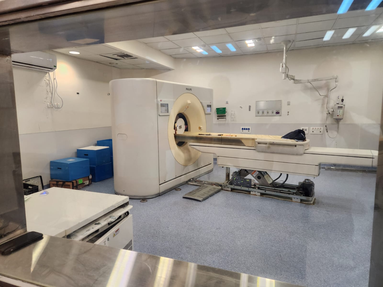 Philips Brilliance iCT 256 Slice CT Scanner 2013 — gantry and patient table in clinical CT suite, available for sale from MTC