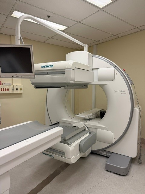 2022 Siemens Symbia Evo Excel dual-head SPECT gamma camera for sale — angled view of gantry, detectors and patient table at MTC Miami, Florida