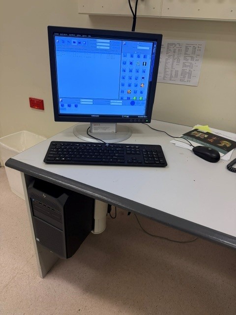 Siemens Symbia Evo Excel acquisition workstation with syngo software running on the operator desk