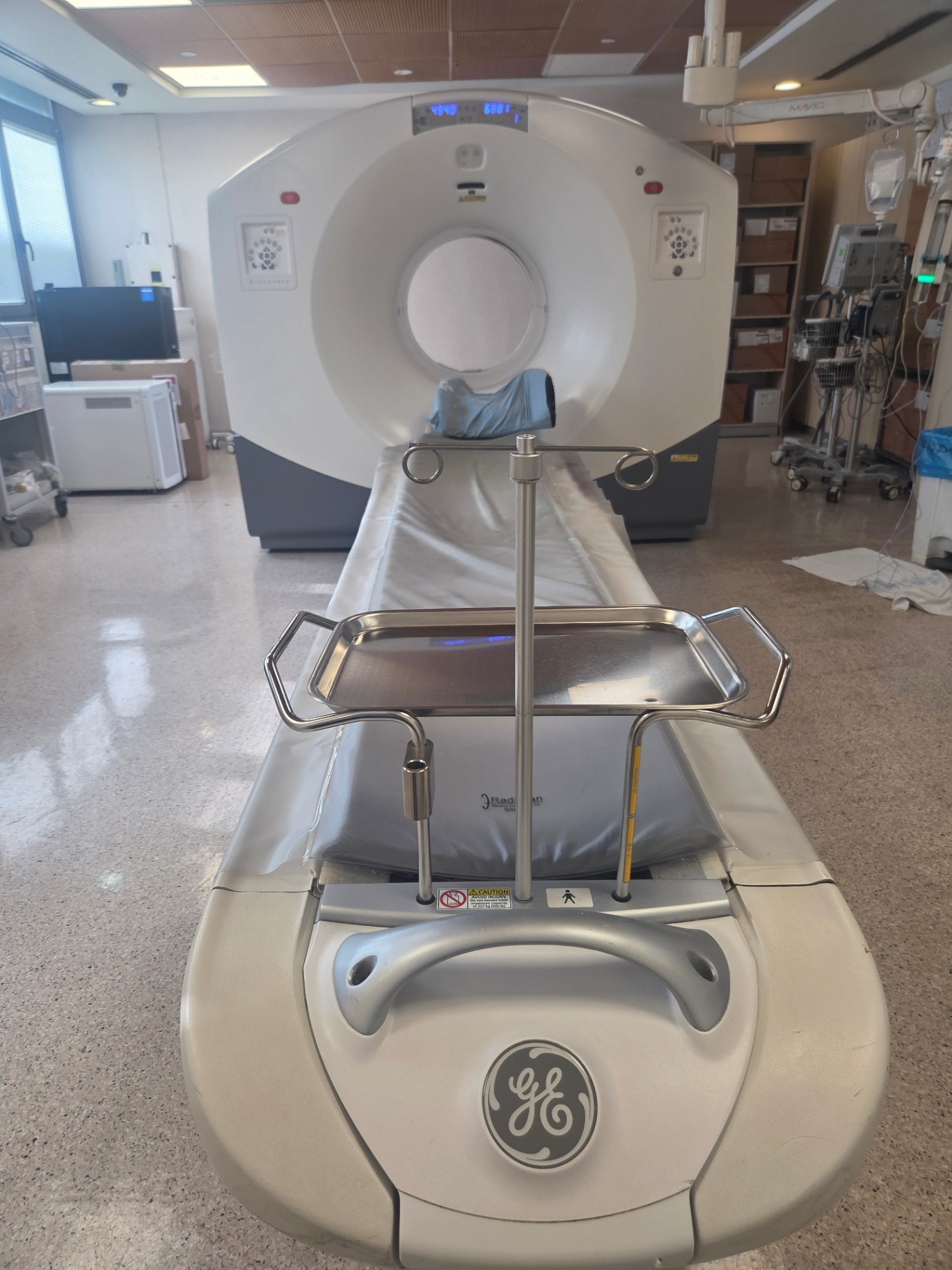GE Discovery 710 PET/CT 64 slice gantry front view with patient table