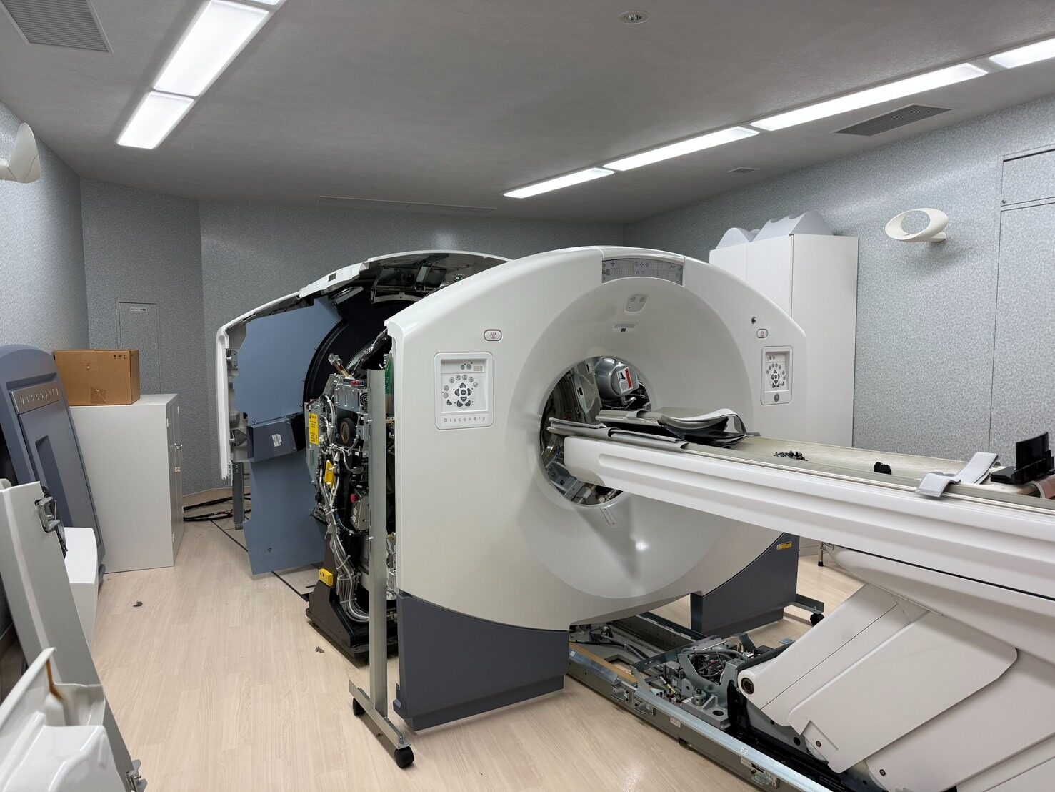 GE Discovery 710 PET-CT deinstallation in Japan with gantry covers opened exposing CT and PET rings